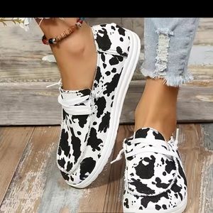 Cow Print Slip Ons